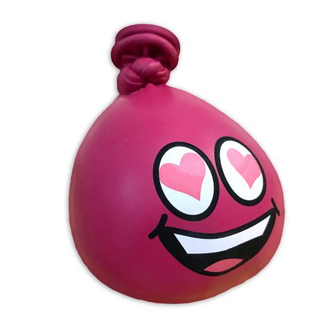 Pinker Anti-Stress-Ballo aus Luftballons mit einem lachenden Gesicht und Herzchen in den Augen.